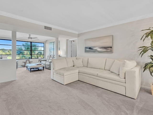 carpeted living room featuring crown molding