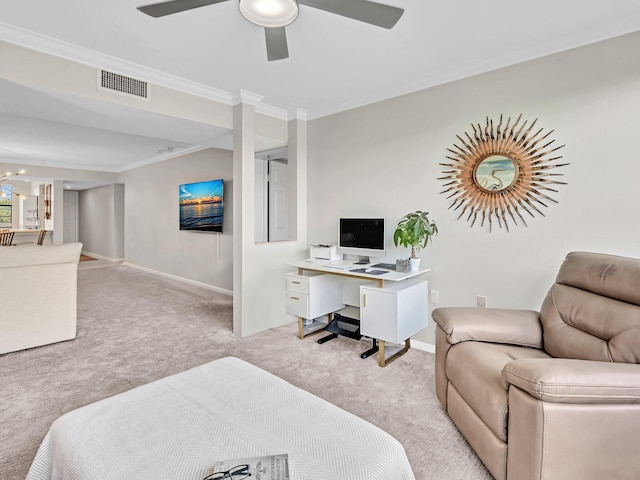 carpeted bedroom featuring ceiling fan and ornamental molding