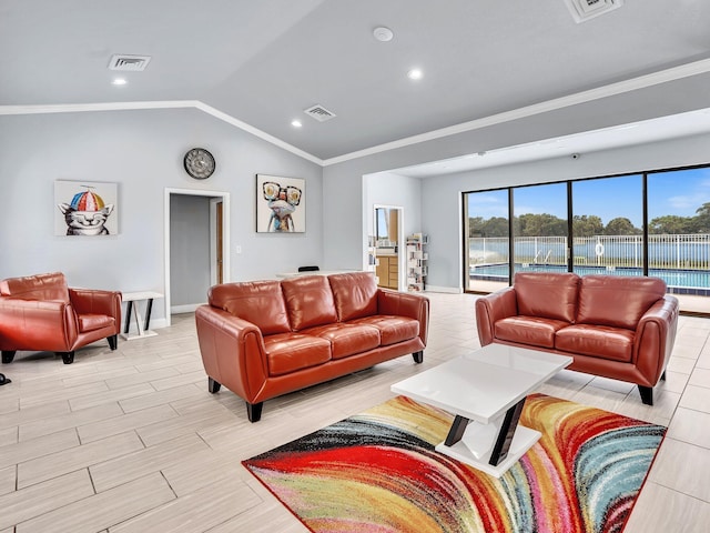 living room with crown molding, light hardwood / wood-style floors, and vaulted ceiling