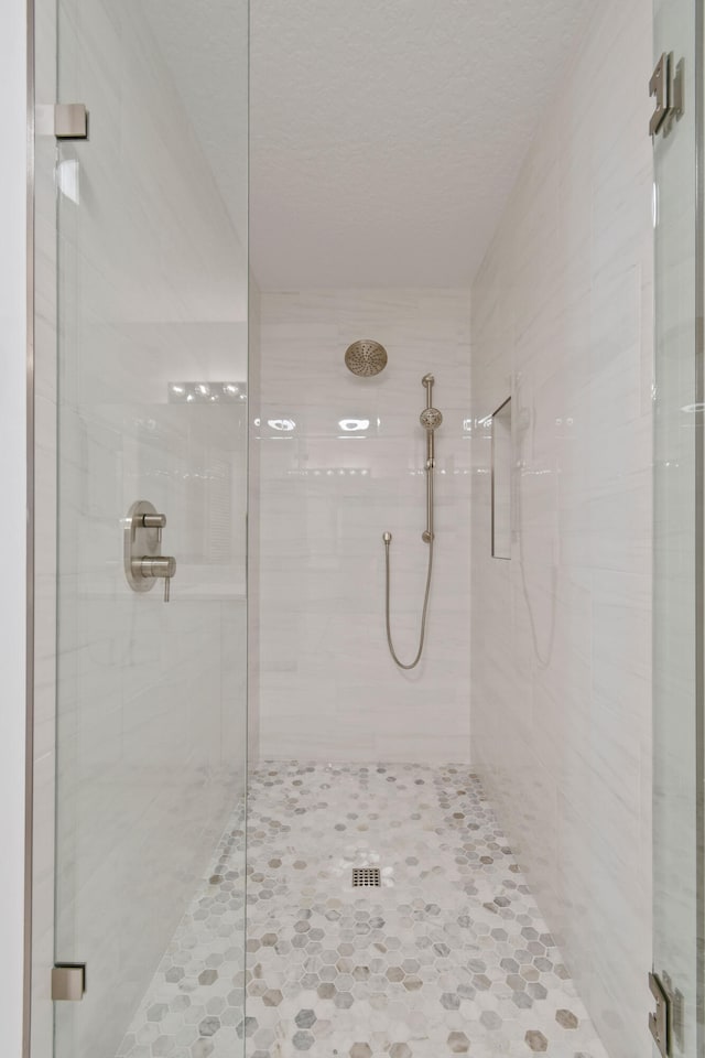 bathroom with an enclosed shower