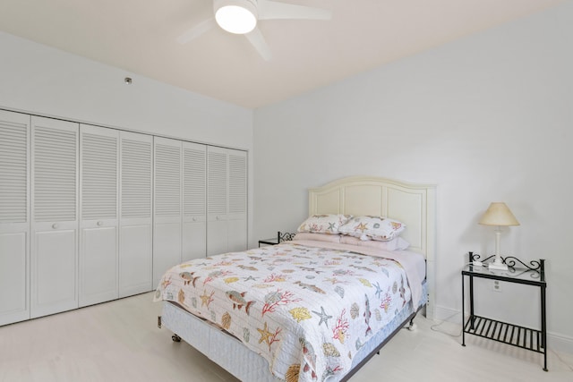 bedroom featuring ceiling fan and a closet