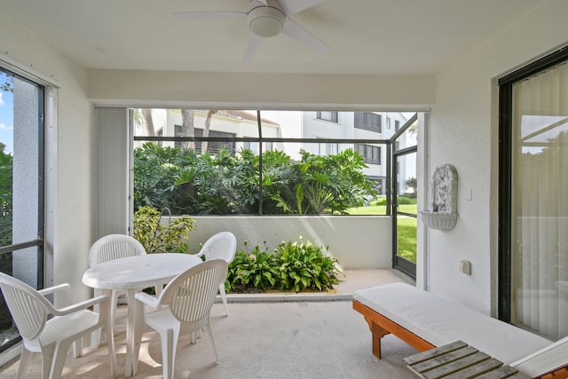 sunroom / solarium with ceiling fan