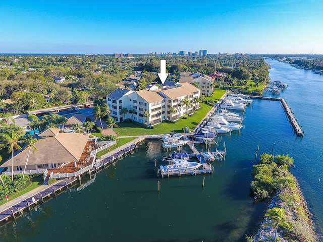 birds eye view of property with a water view