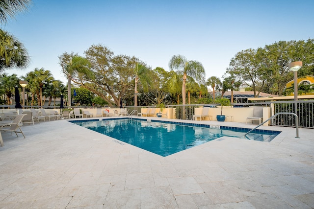 view of pool featuring a patio area