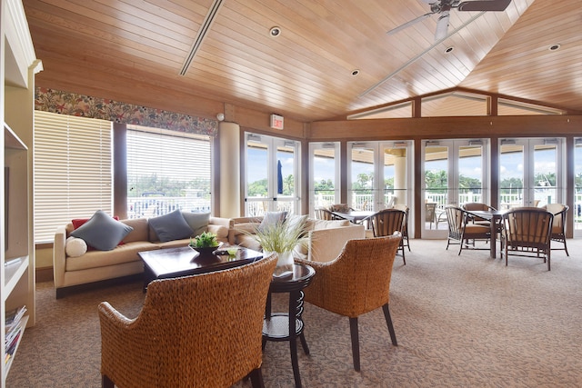 sunroom with vaulted ceiling, french doors, wood ceiling, and ceiling fan