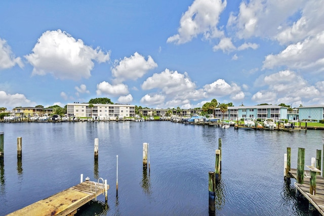 property view of water featuring a dock