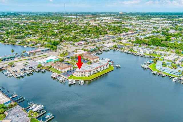 drone / aerial view with a water view