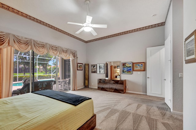 bedroom with ceiling fan, light colored carpet, and access to outside