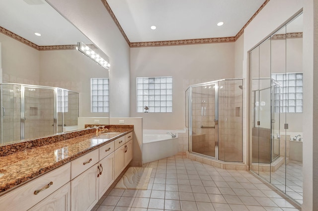 bathroom featuring vanity, tile patterned floors, and independent shower and bath