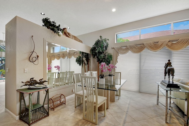 dining space with light tile patterned floors