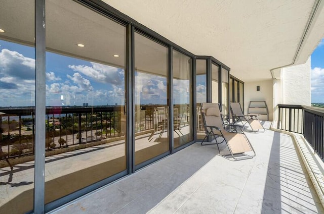 balcony featuring a sunroom