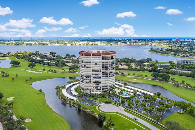 bird's eye view with view of golf course and a water view