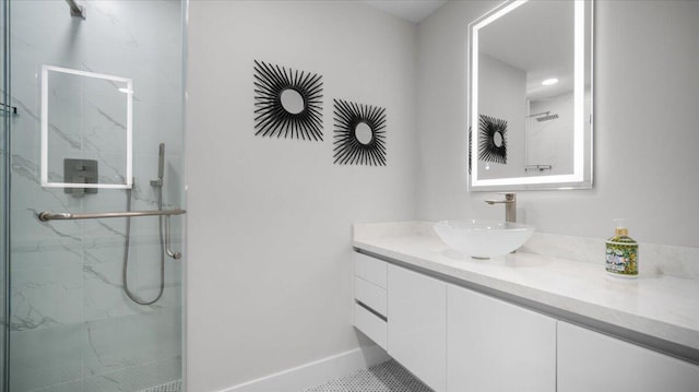 bathroom with vanity and an enclosed shower