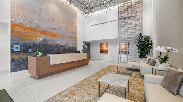 reception area featuring an inviting chandelier