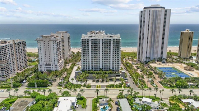 aerial view with a water view and a view of the beach