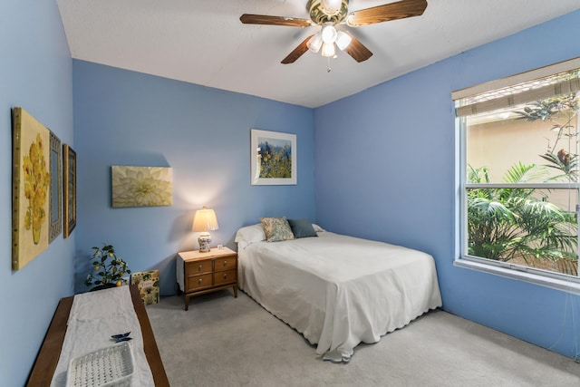 bedroom featuring carpet and ceiling fan