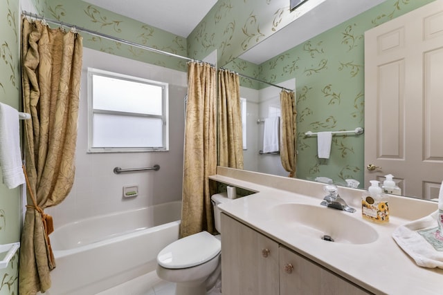 full bathroom with vanity, shower / bath combination with curtain, and toilet