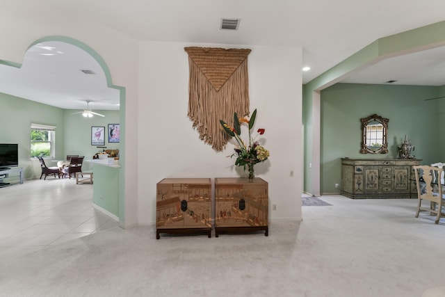 corridor with light colored carpet