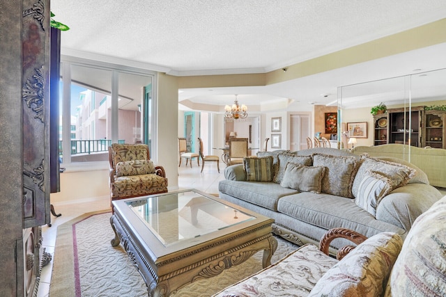 living room with a tray ceiling, ornamental molding, a chandelier, and a textured ceiling