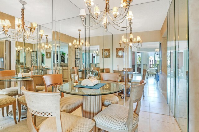 tiled dining space featuring a notable chandelier