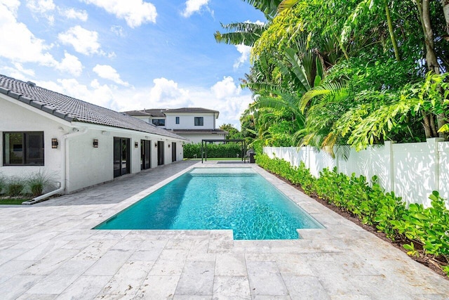 view of pool featuring a pergola and a patio area