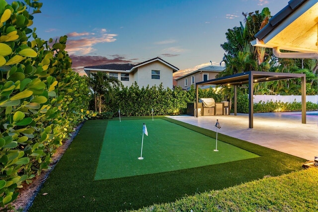 view of property's community with a patio area