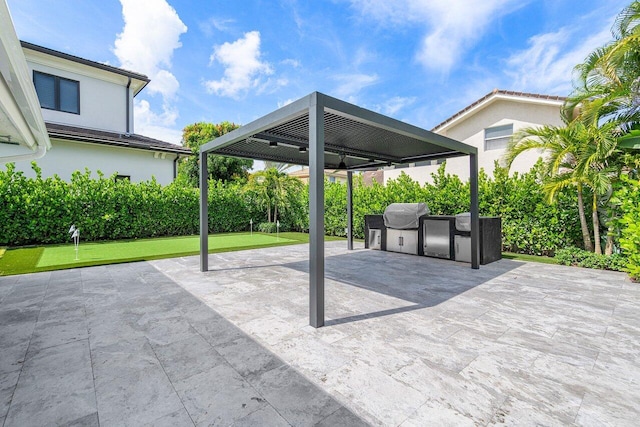 view of patio featuring a grill