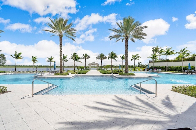 view of pool featuring a patio area