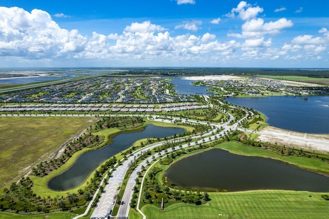 drone / aerial view with a water view