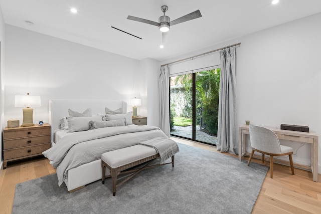 bedroom featuring light hardwood / wood-style floors, access to outside, and ceiling fan