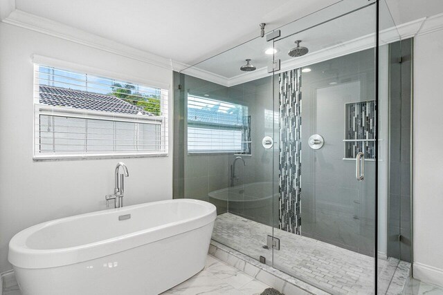 bathroom featuring tile patterned floors, crown molding, and independent shower and bath