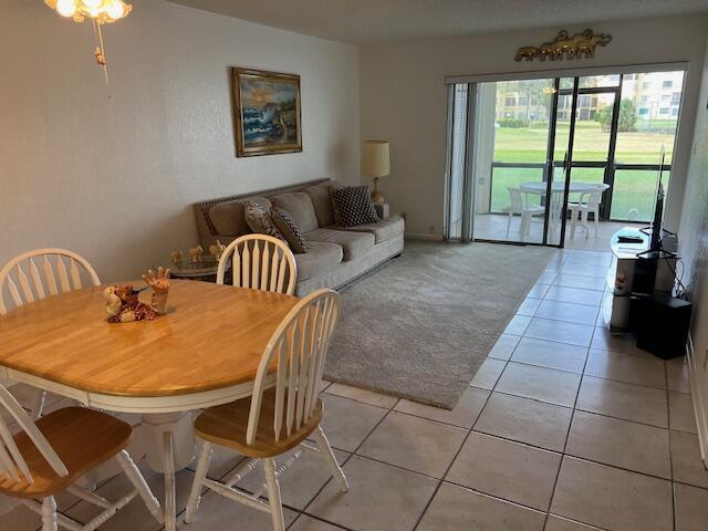 dining room featuring light tile patterned floors