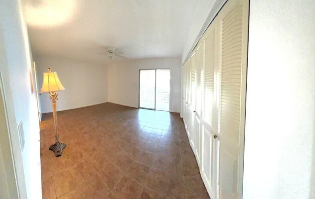 empty room featuring ceiling fan