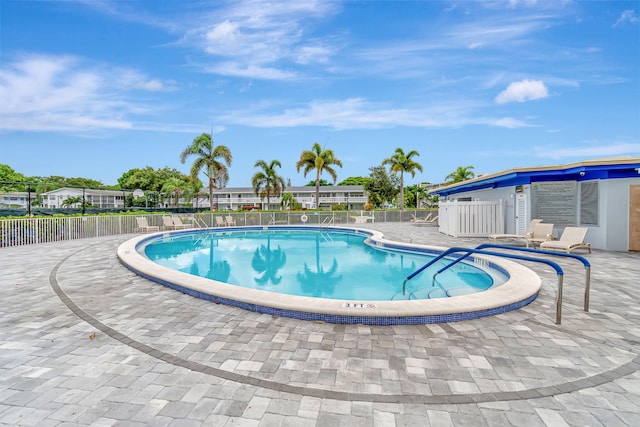 view of pool featuring a patio