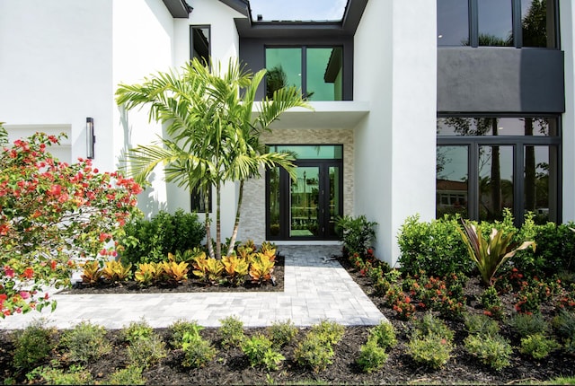 property entrance featuring french doors