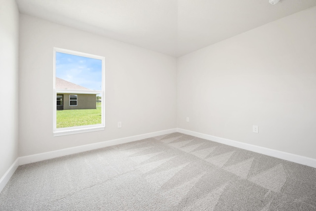 unfurnished room featuring carpet floors