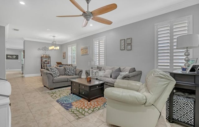 tiled living room featuring ceiling fan with notable chandelier and crown molding