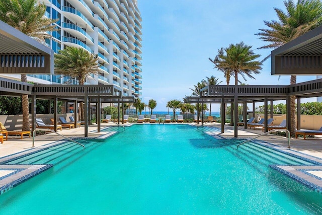 view of pool featuring a patio and a pergola