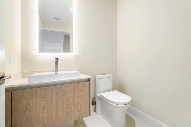 washroom featuring stacked washer and dryer