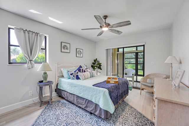 bedroom featuring ceiling fan and light wood-type flooring