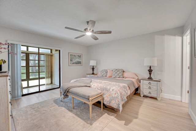 bedroom featuring access to outside, ceiling fan, and light hardwood / wood-style floors