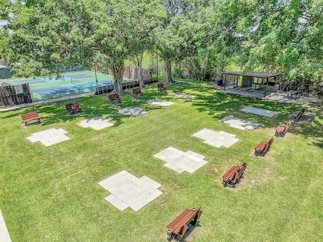 view of yard featuring tennis court