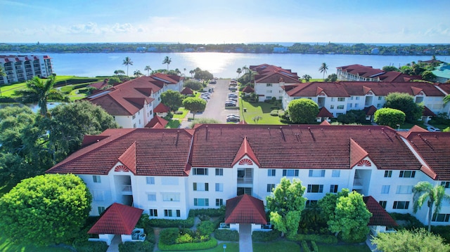 bird's eye view with a water view