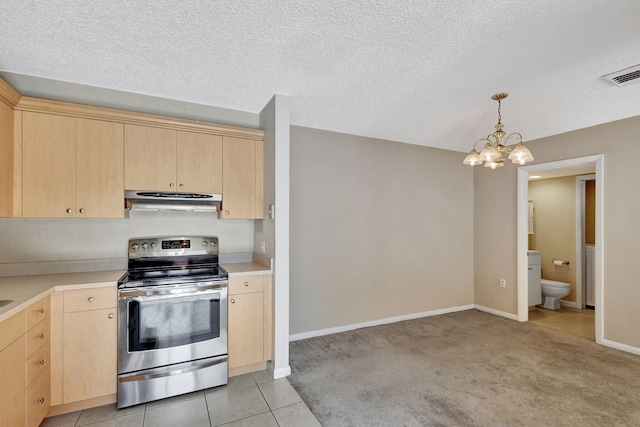 bathroom with a shower with door and washer / clothes dryer