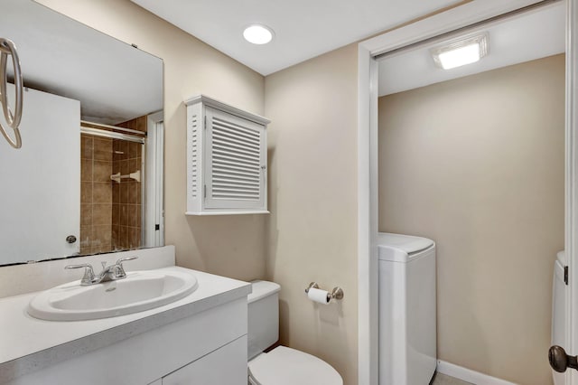 clothes washing area featuring washer and dryer