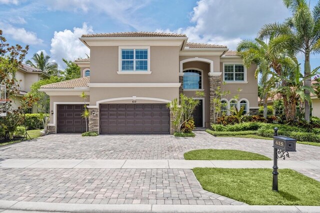 mediterranean / spanish-style home featuring a garage