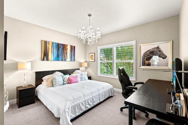 carpeted bedroom featuring a notable chandelier