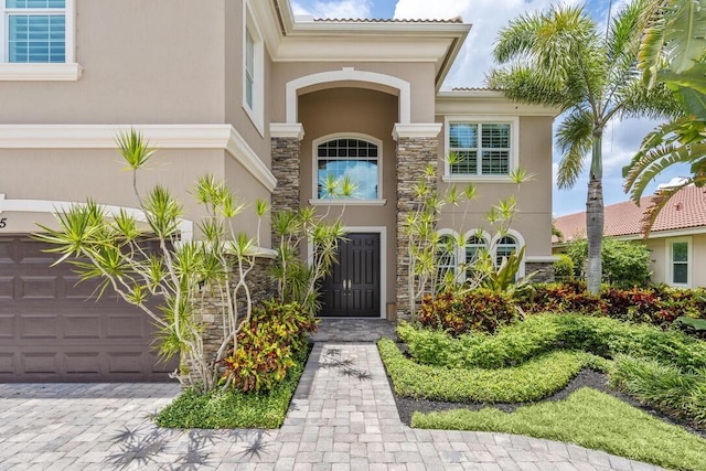 property entrance featuring a garage