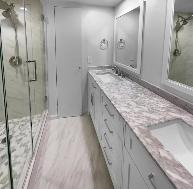 bathroom with vanity and walk in shower