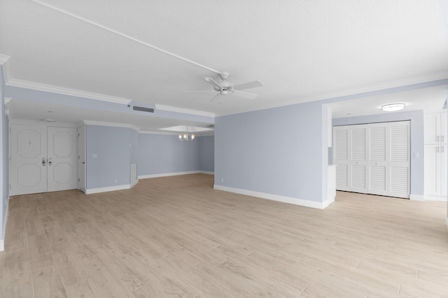 interior space with ceiling fan with notable chandelier, ornamental molding, light wood-type flooring, and visible vents